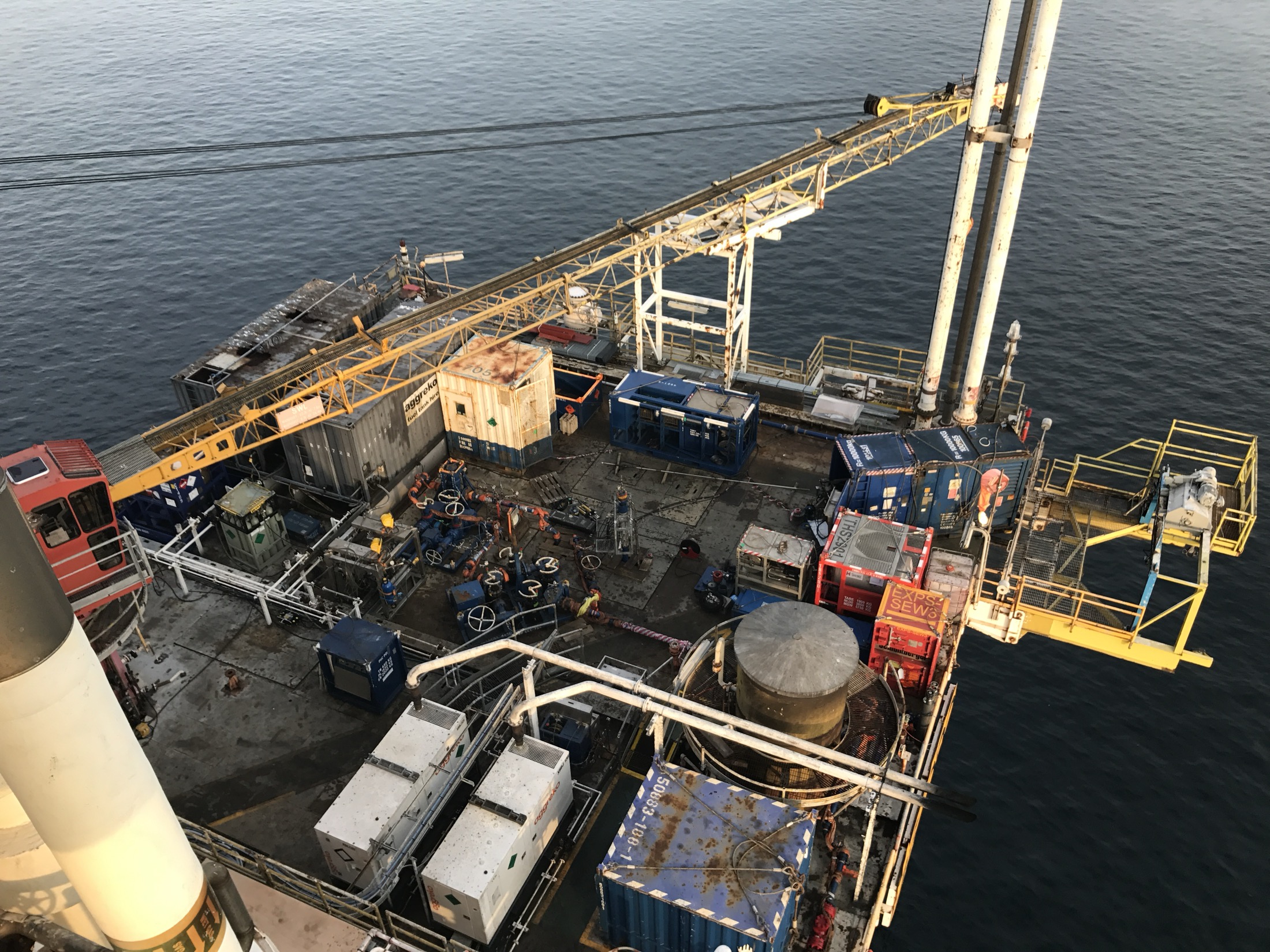 Offshore worksite with intervention equipment positioned above open water.